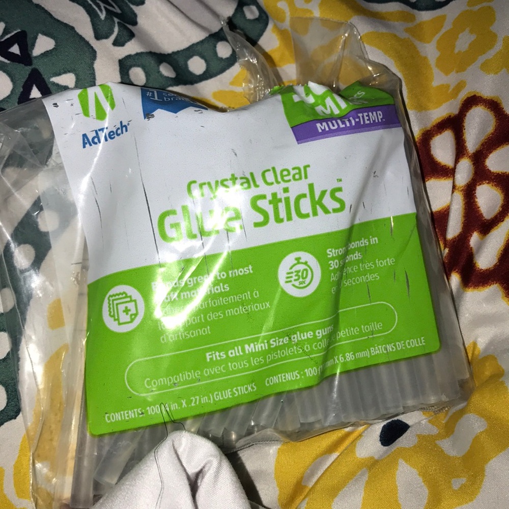 100 pack of mini glue sticks .